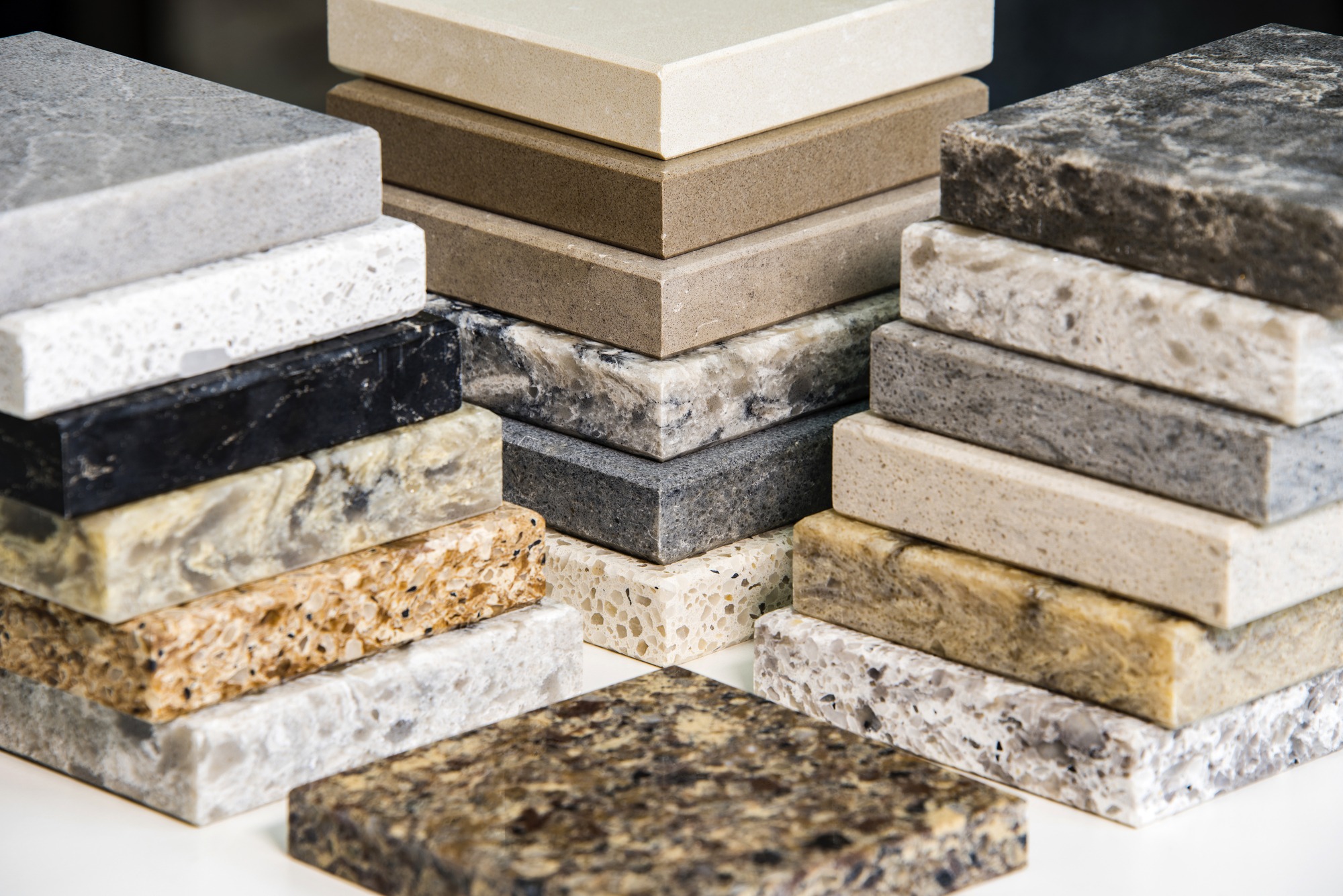 Countertop slab samples in marble, granite, and quartz