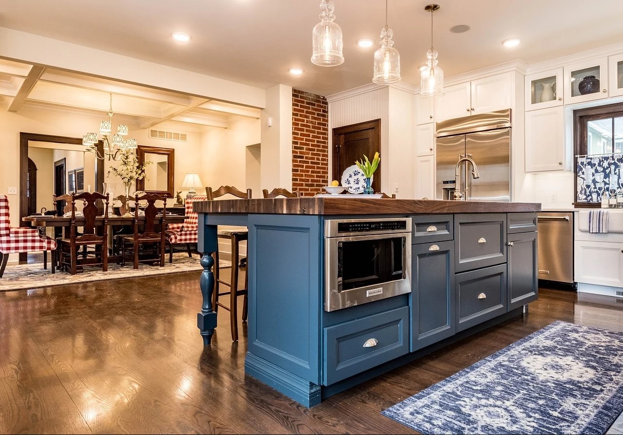kitchen island with storage and built-in microwave